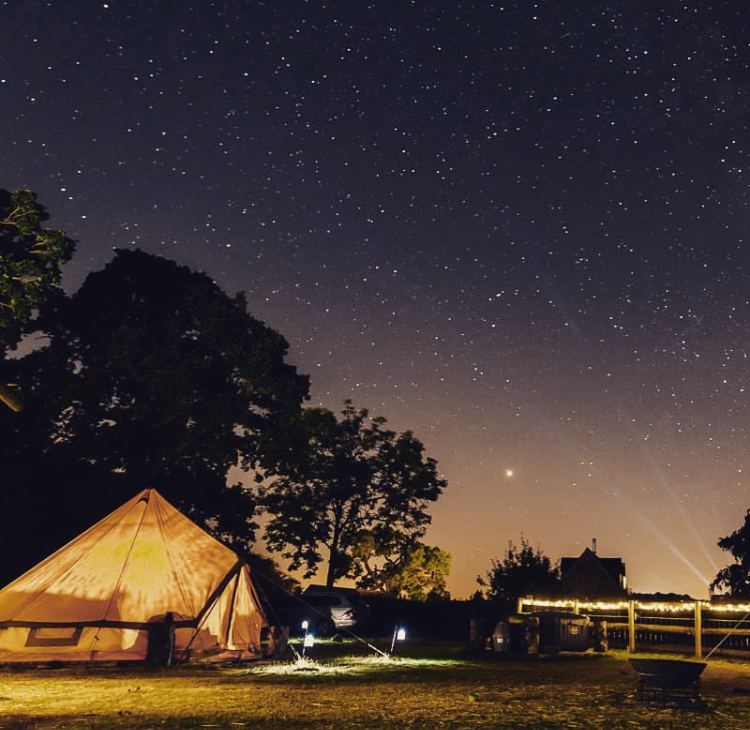 Bell tent glamping under the starry sky in the Cotswolds at Campfires & Stars, Oxfordshire