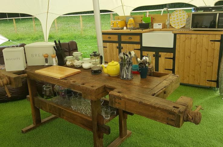 Kitchen area in the belle tents at Campfires & Stars, a glamping site in the Cotswolds, Oxfordshire
