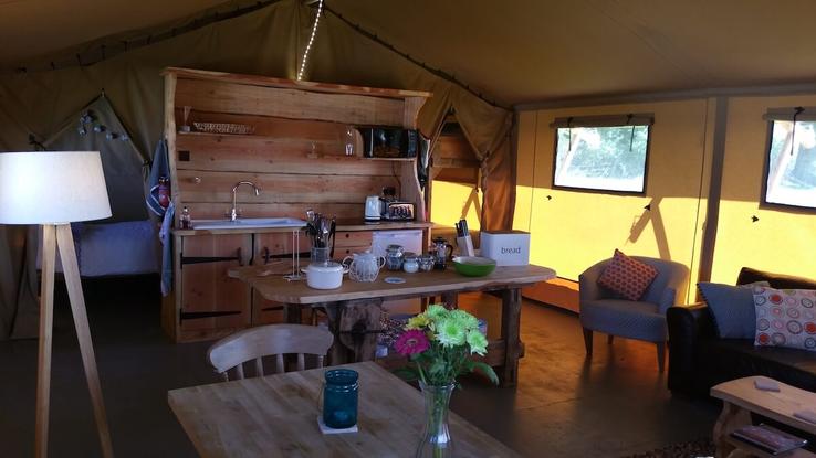 Inside the safari tent at Campfires & Stars, a glamping site in the Cotswolds, Oxfordshire
